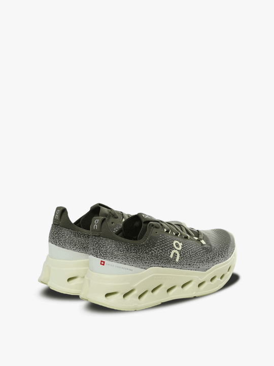 Green sneakers, back view