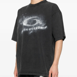 black t-shirt worn by a person, showing the t-shirt fit