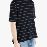 Navy t-shirt worn by a person, showing the t-shirt fit