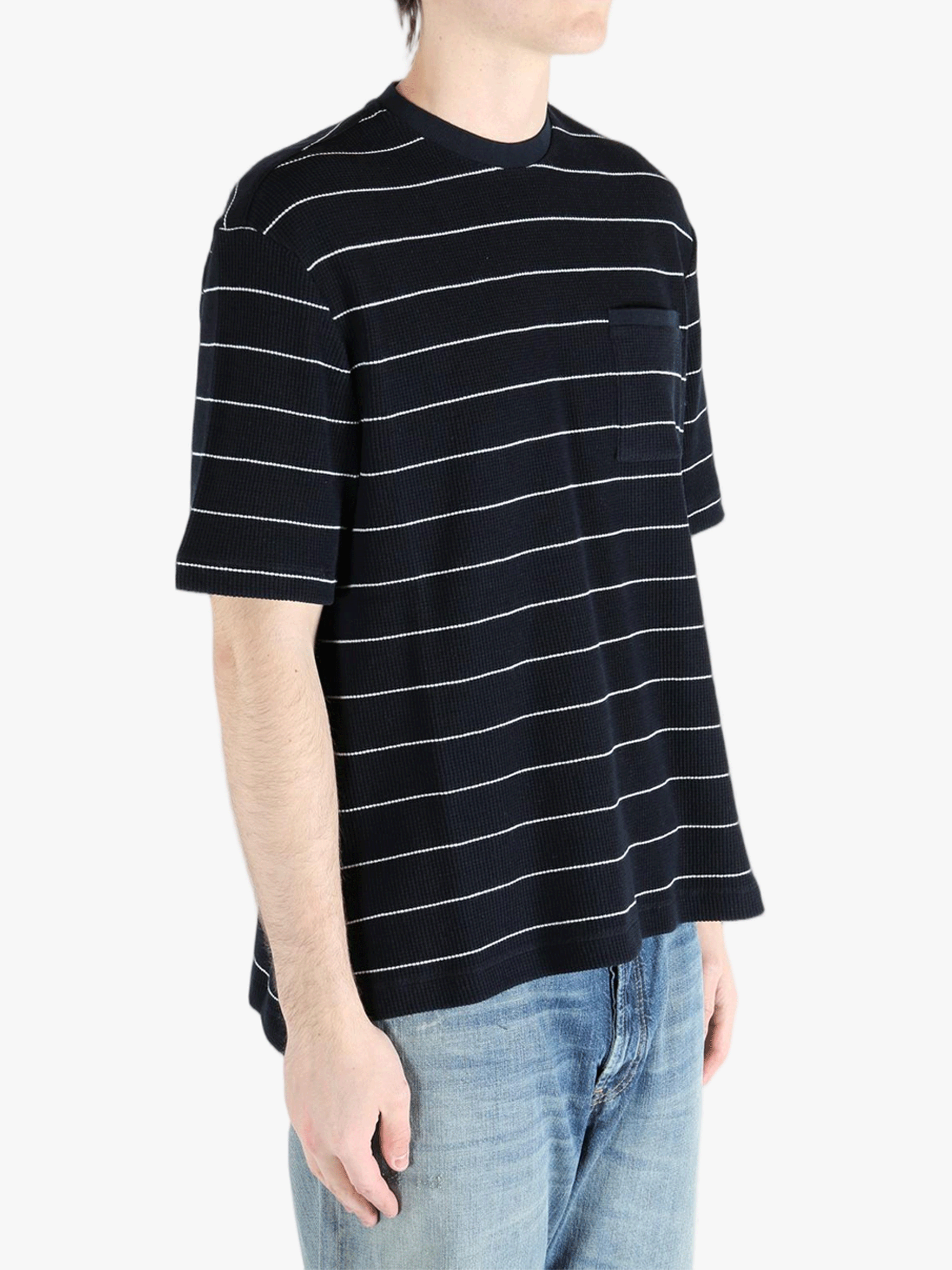 Navy t-shirt worn by a person, showing the t-shirt fit