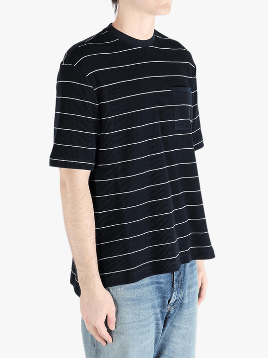 Navy t-shirt worn by a person, showing the t-shirt fit