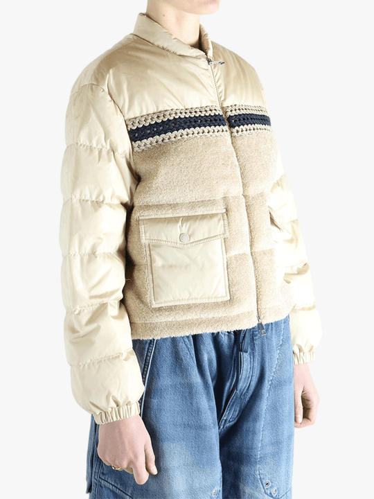 Tan jacket worn by a person, showing the jacket's fit