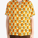 Orange shirt worn by a person, showing the shirt's fit
