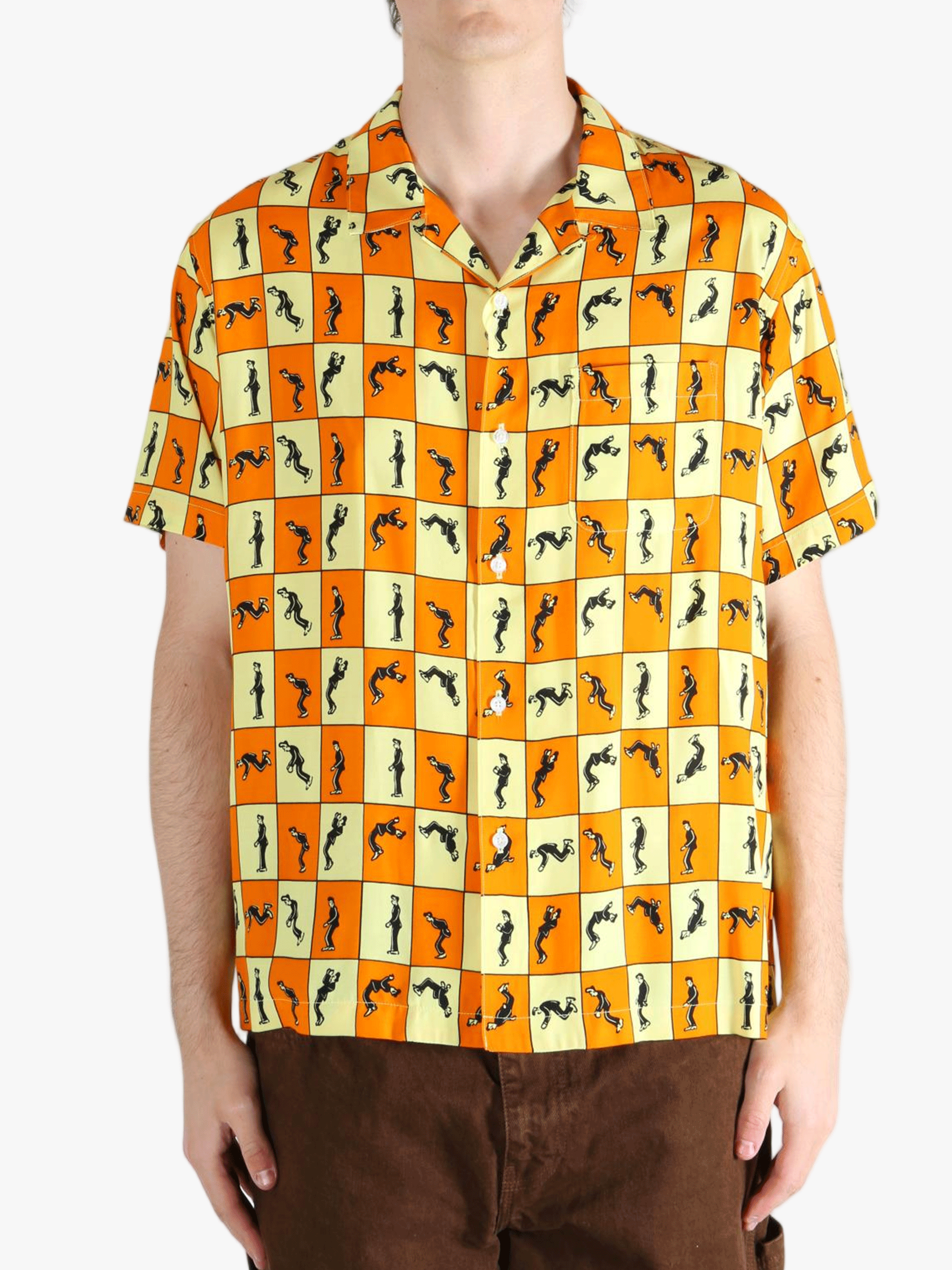 Orange shirt worn by a person, showing the shirt's fit