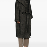 Black coat  worn by a person, showing the coat's fit