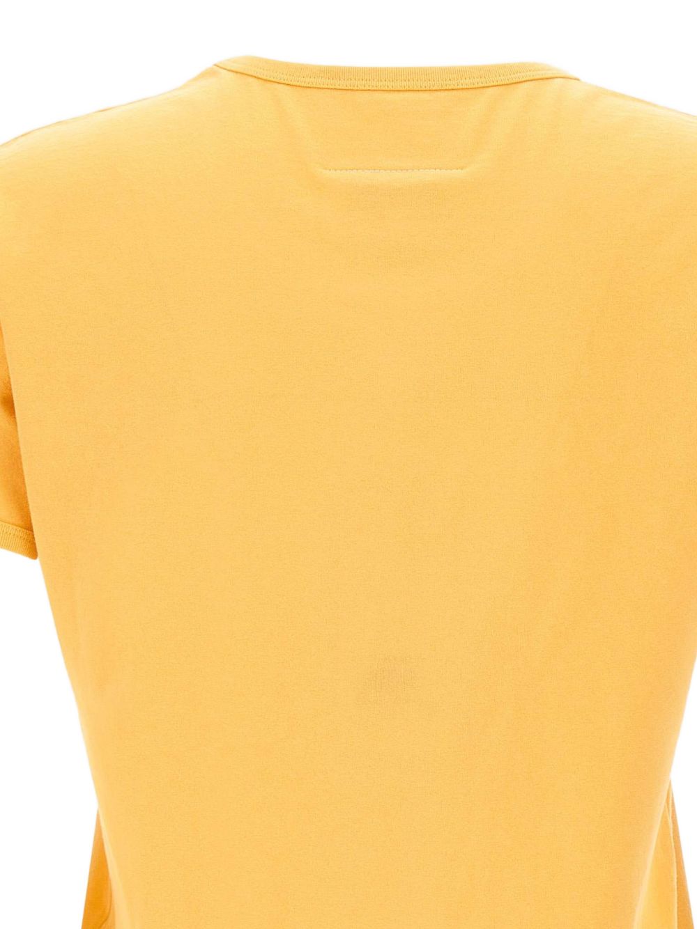 Close up of yellow tops, showing texture of the cotton fabric