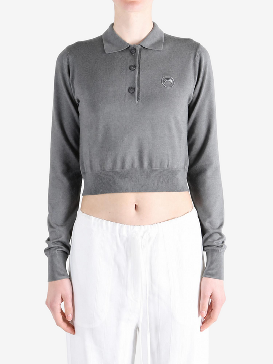 Grey t-shirt worn by a person, showing the t-shirt fit
