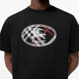 Black t-shirt worn by a person, showing the t-shirt fit