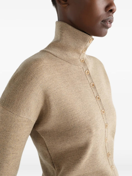 Tan top worn by a person, showing the top fit