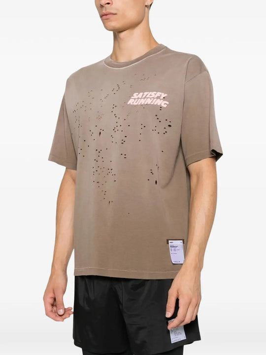 Tan t-shirt worn by a person, showing the t-shirt fit