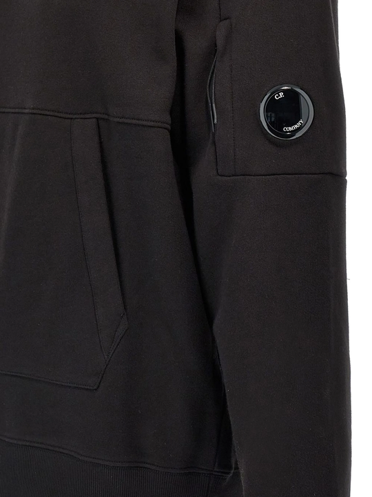 Close up of black coat, showing texture of the cotton fabric