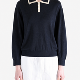 Navy shirt worn by a person, showing the shirt fit