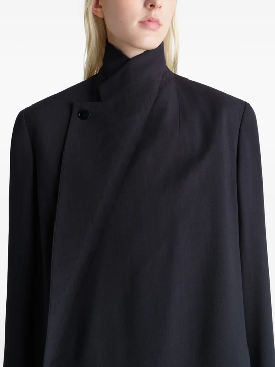 Close up of black coats , showing texture of the blended fabric