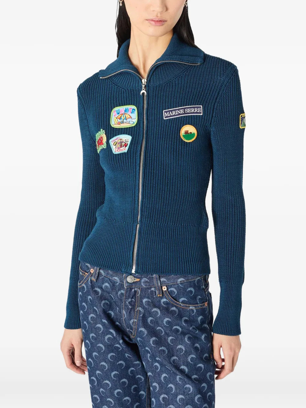 Blue jacket worn by a person, showing the jacket fit
