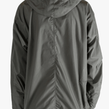 Grey jacket worn by a person, showing the jacket's fit