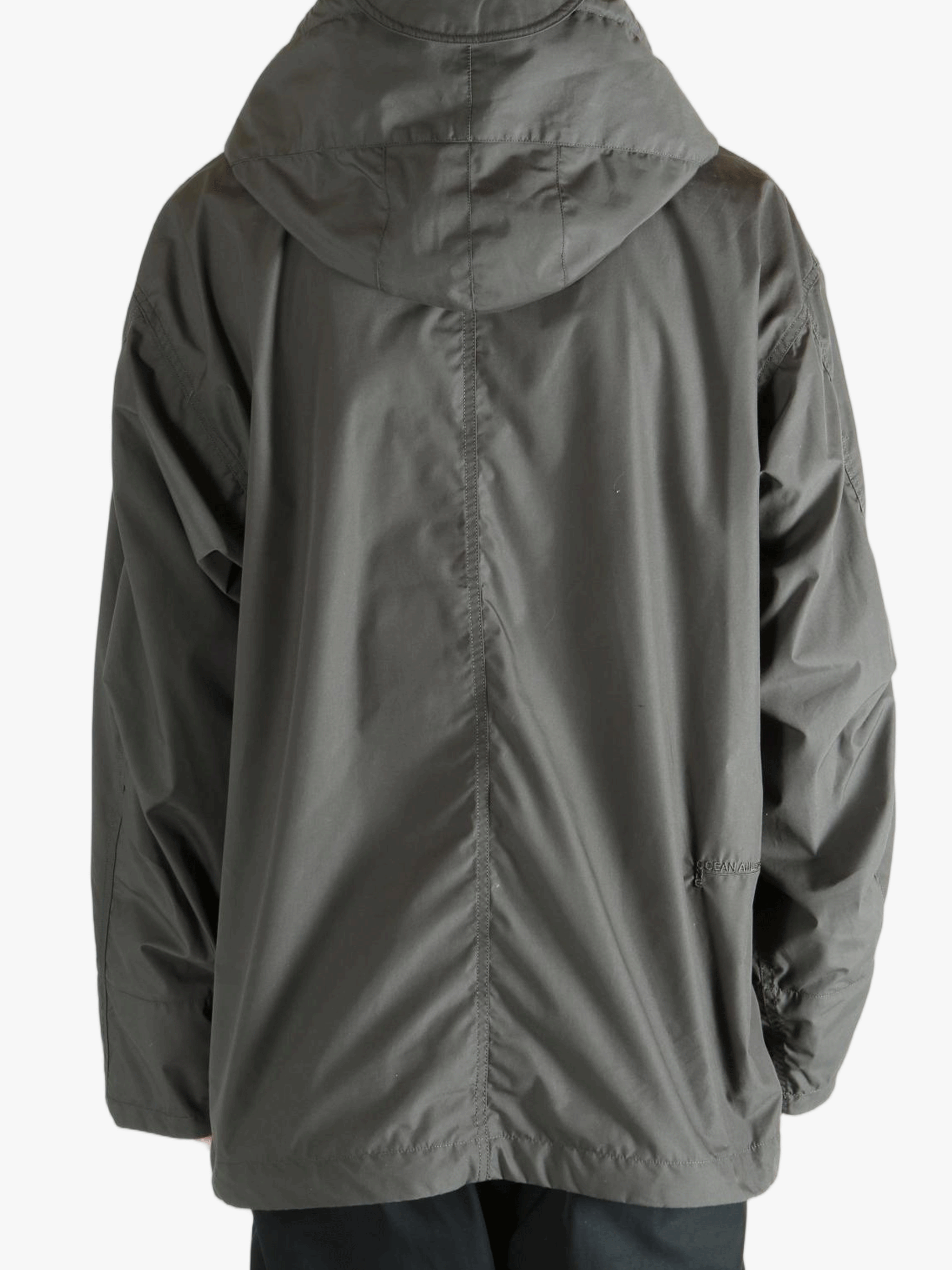 Grey jacket worn by a person, showing the jacket's fit
