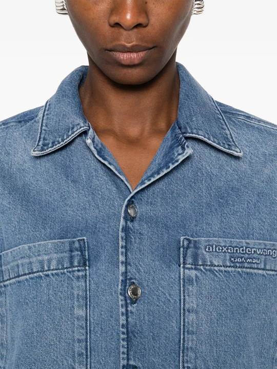 Close up of blue shirt, showing texture of the Cotton fabric