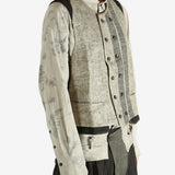 Green gilet worn by a person, showing the gilet's fit