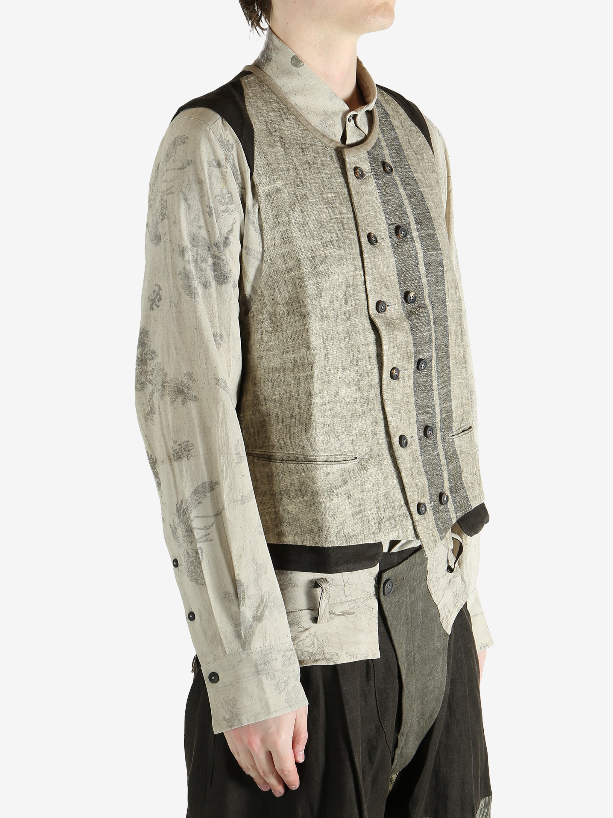 Green gilet worn by a person, showing the gilet's fit