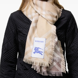 Brown scarf worn by a person, showing the scarf fit