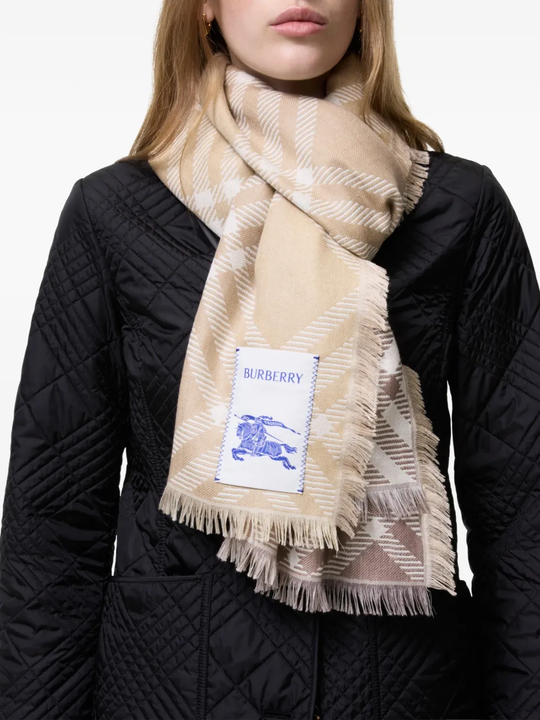 Brown scarf worn by a person, showing the scarf fit