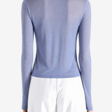 Blue t-shirt worn by a person, showing the t-shirt fit