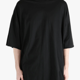 Black t-shirts worn by a person, showing the t-shirts fit