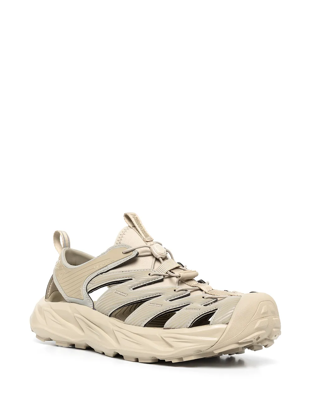 Tan sandals, side view