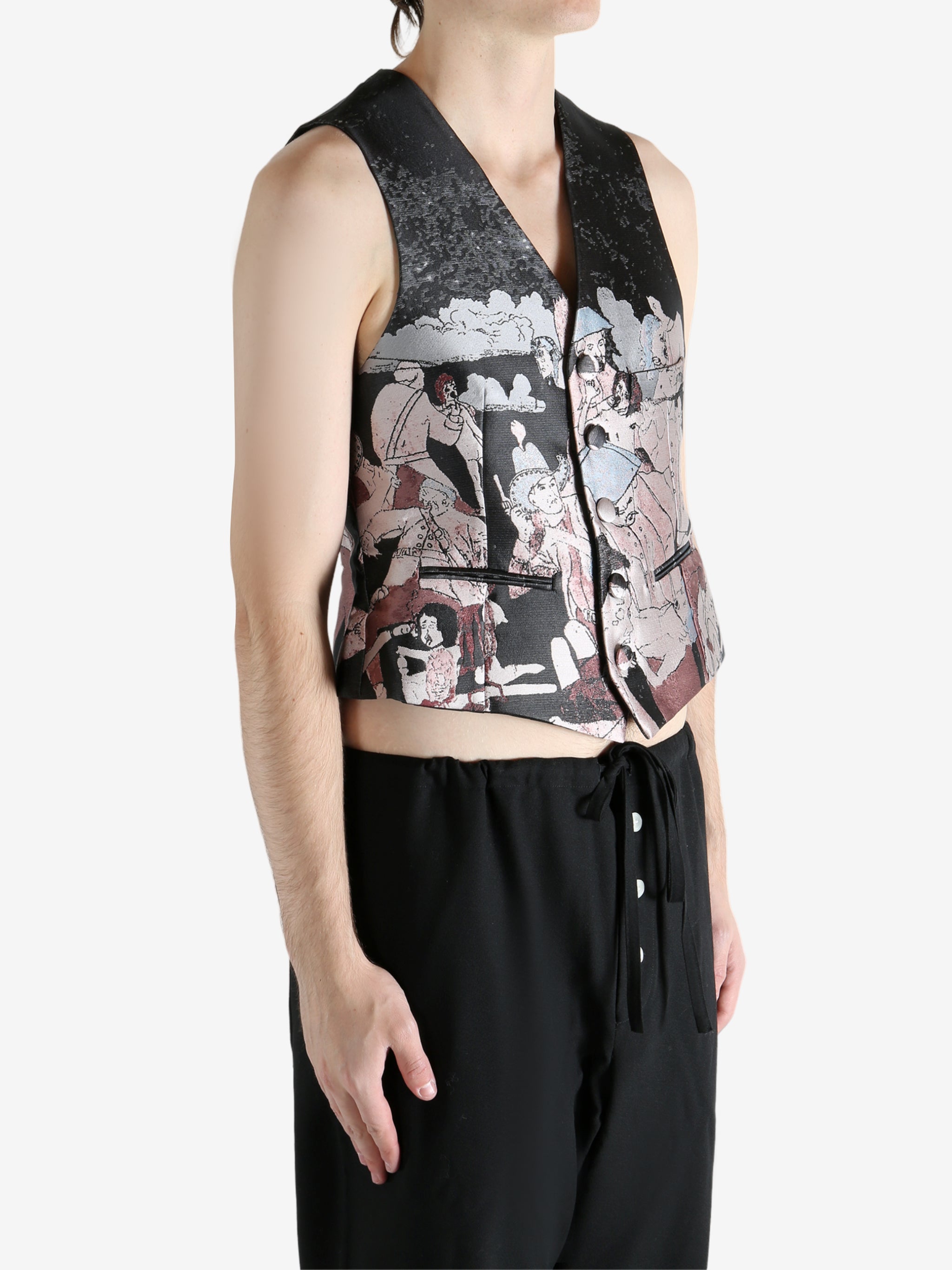 Black vest worn by a person, showing the vest fit