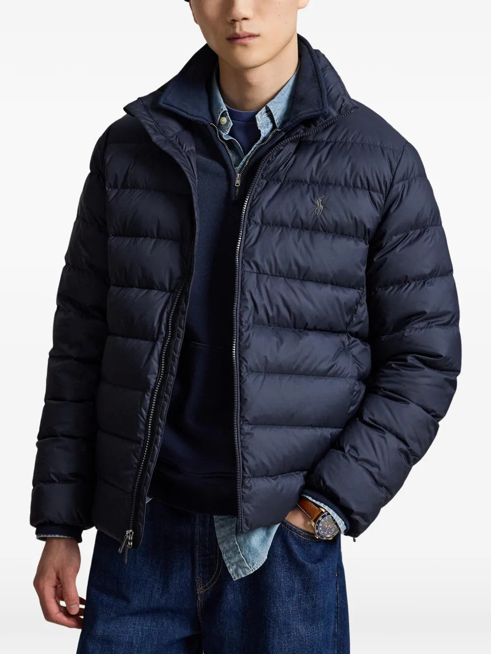 Navy jacket worn by a person, showing the jacket fit