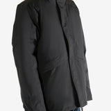 Black jacket worn by a person, showing the jacket's fit