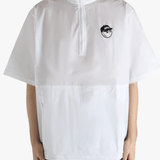 white t-shirts worn by a person, showing the t-shirts fit