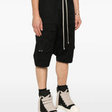 Black short worn by a person, showing the short's fit