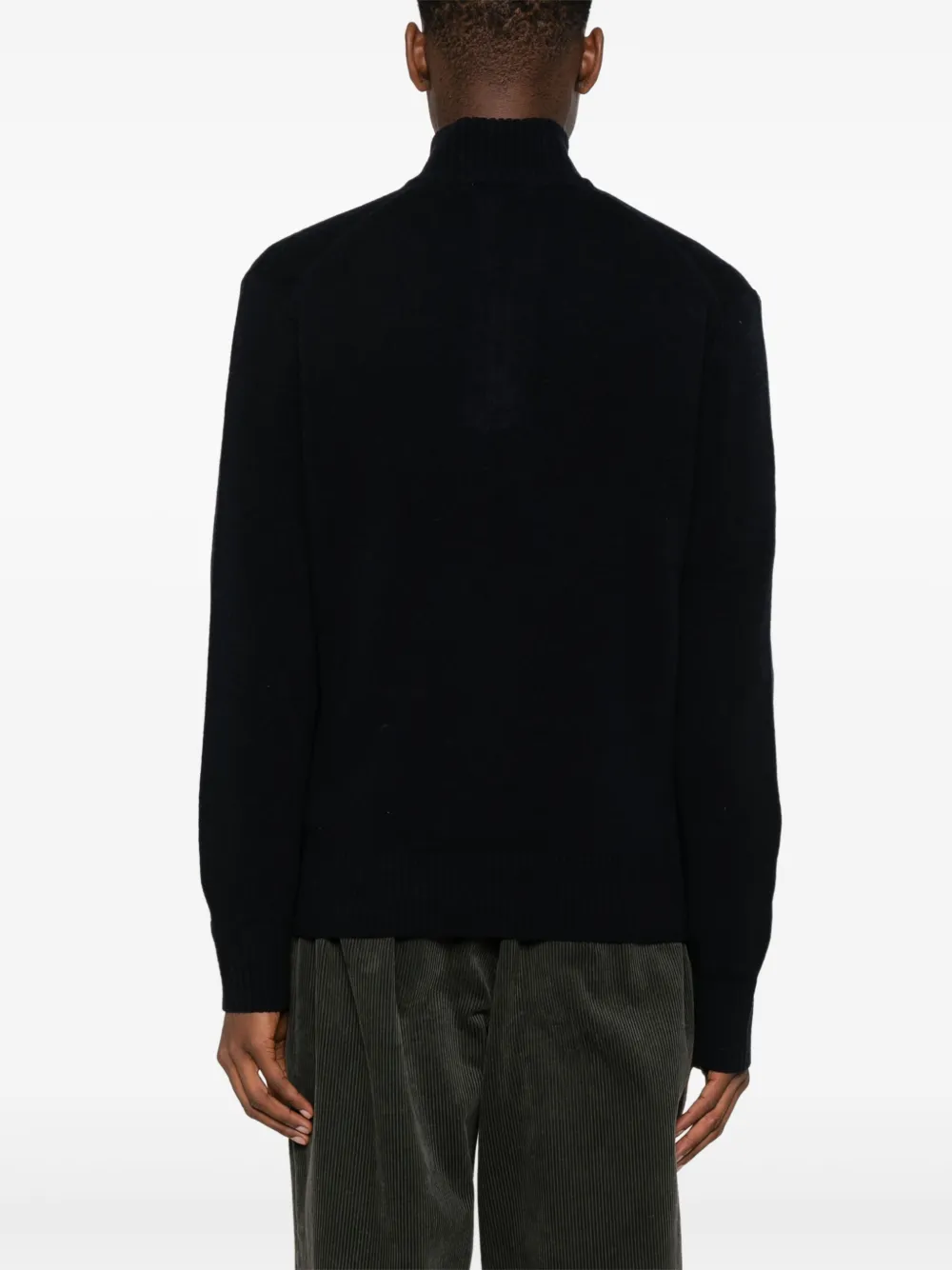 Navy hoddie worn by a person, showing the hoddie's fit