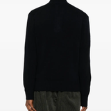 Navy hoddie worn by a person, showing the hoddie's fit