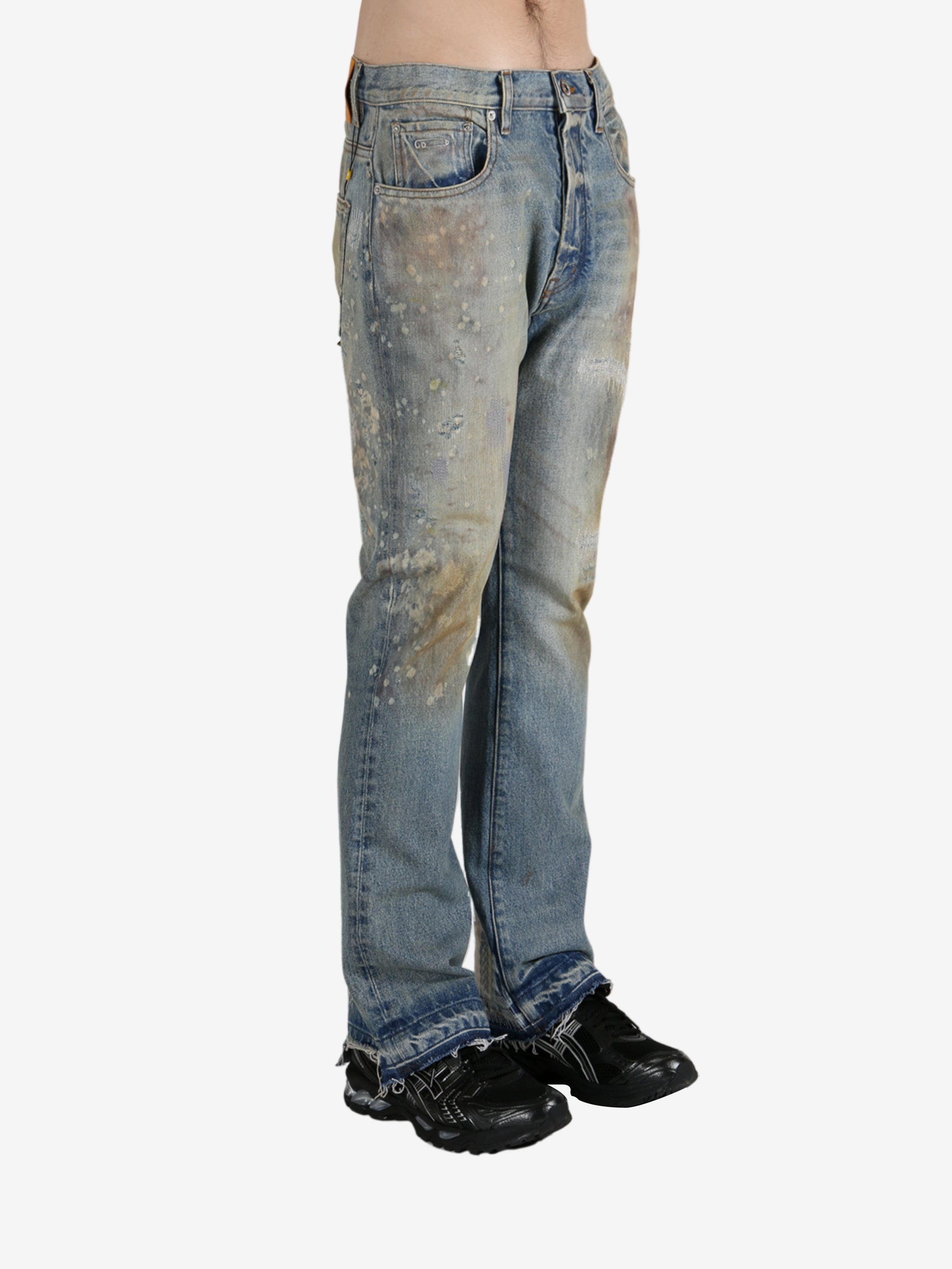 Blue jeans worn by a person, showing the jeans's fit