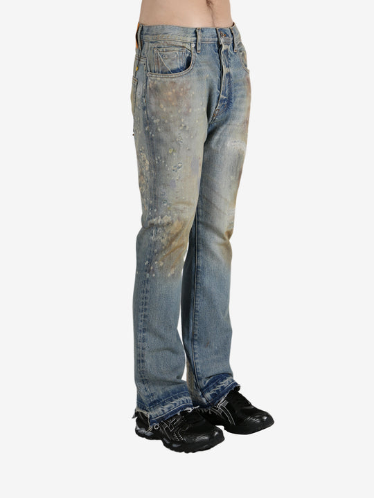 Blue jeans worn by a person, showing the jeans's fit