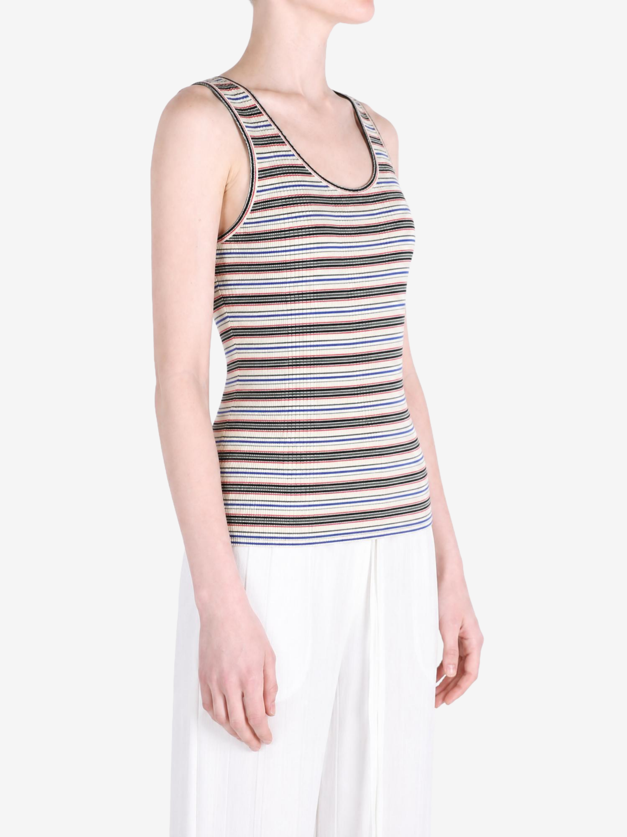 Tan top worn by a person, showing the top fit