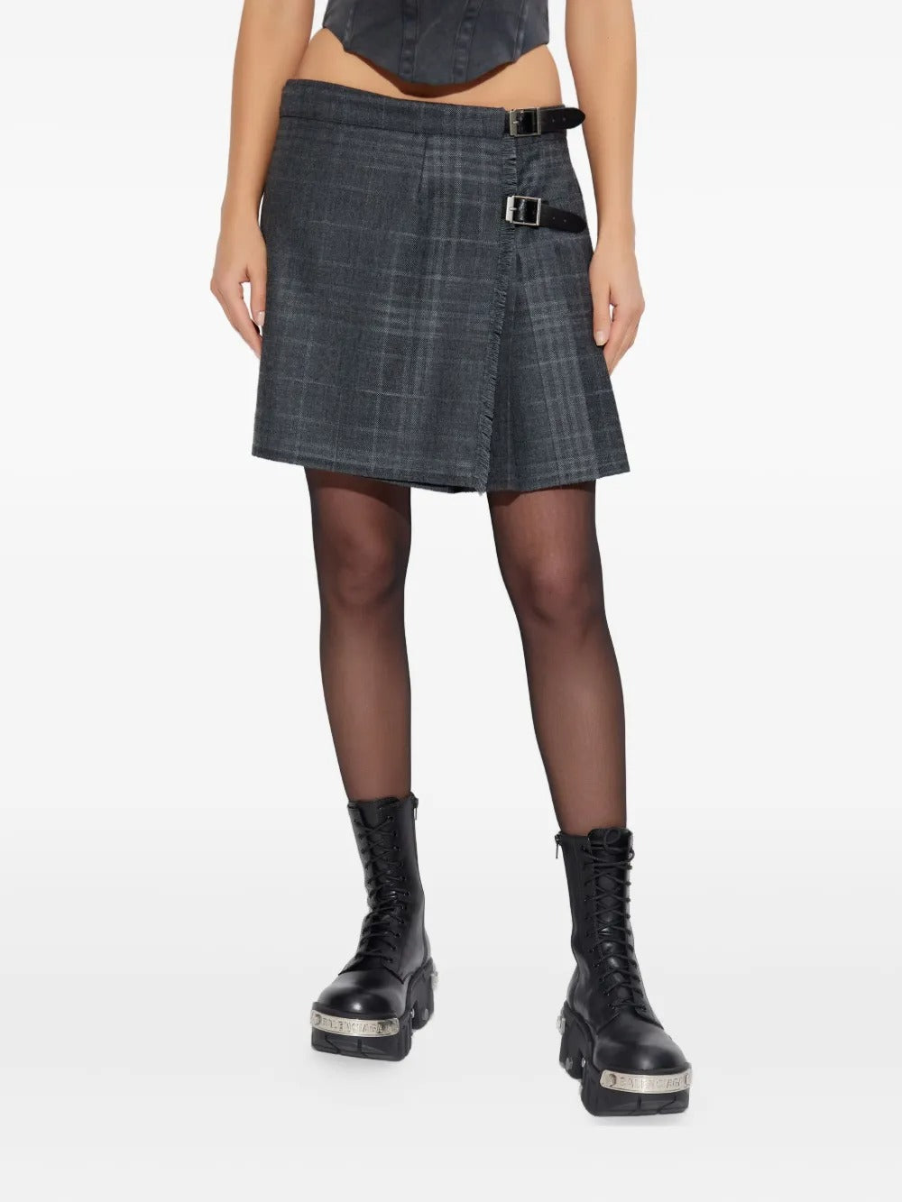 Grey skirt worn by a person, showing the skirt's fit