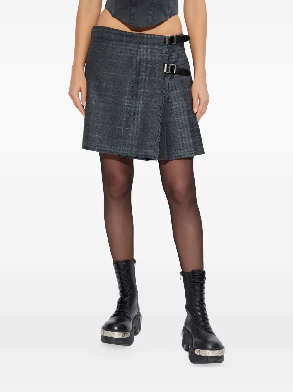 Grey skirt worn by a person, showing the skirt's fit