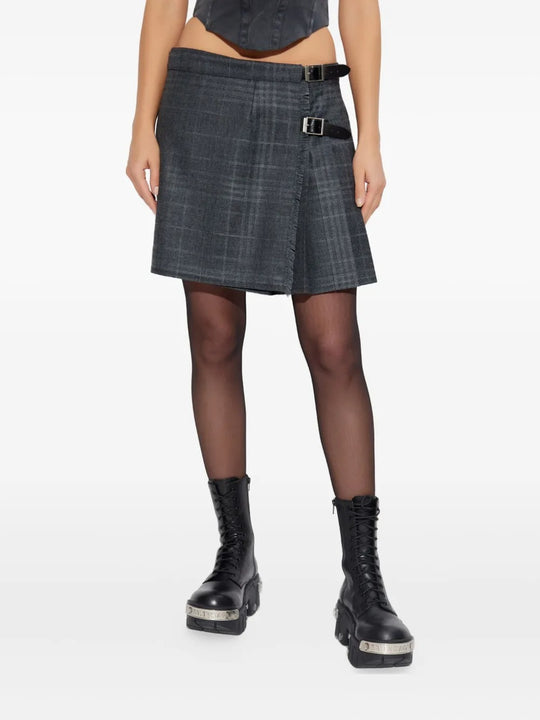 Grey skirt worn by a person, showing the skirt's fit