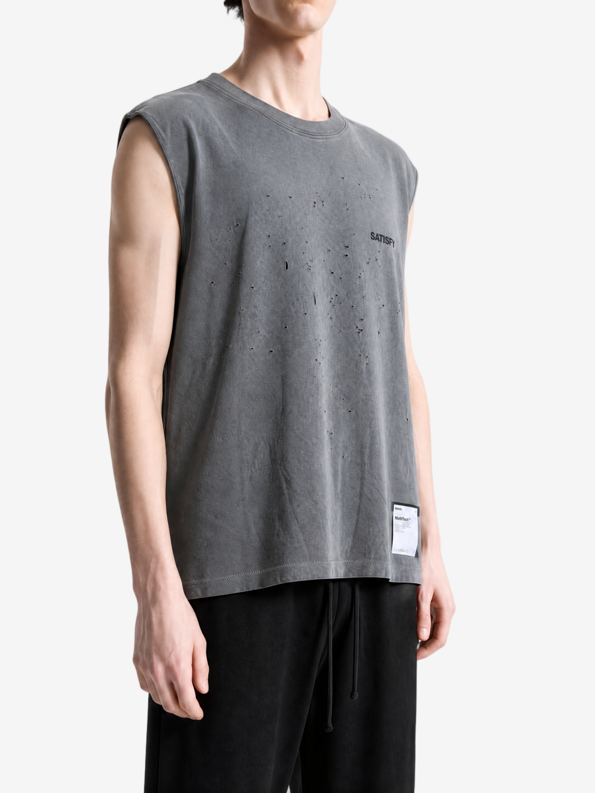 Grey t-shirt worn by a person, showing the t-shirt fit