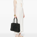 Black bag worn by a person, showing the bag's fit