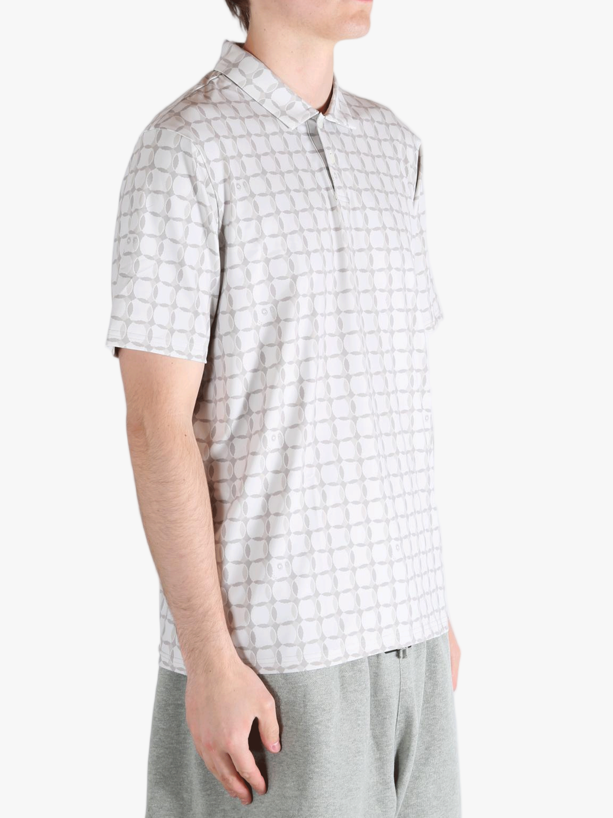 Grey shirt worn by a person, showing the shirt's fit