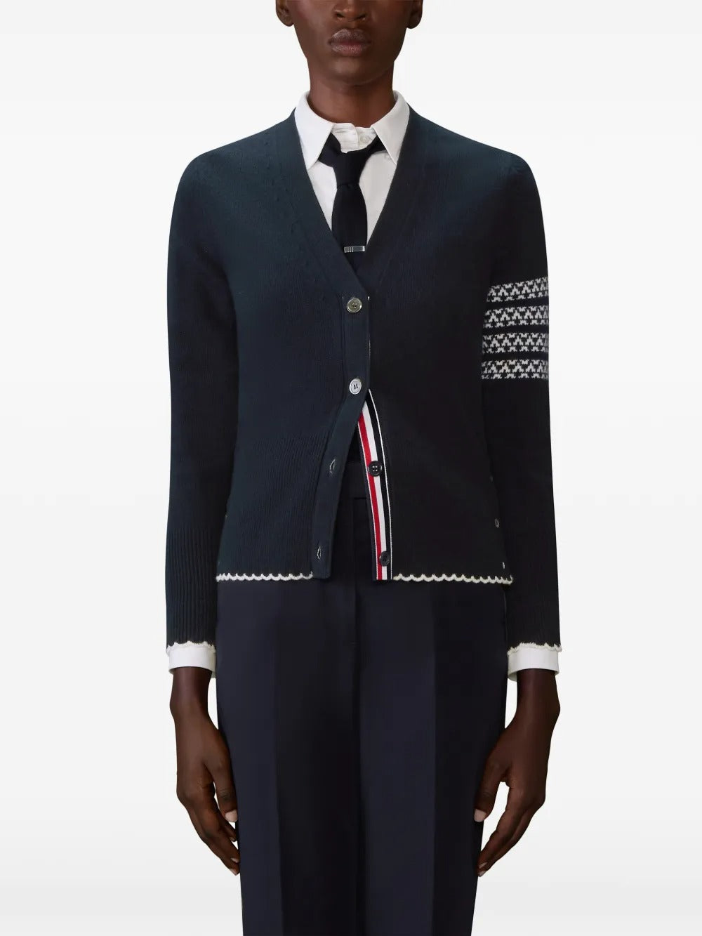 Navy cardigan worn by a person, showing the cardigan's fit