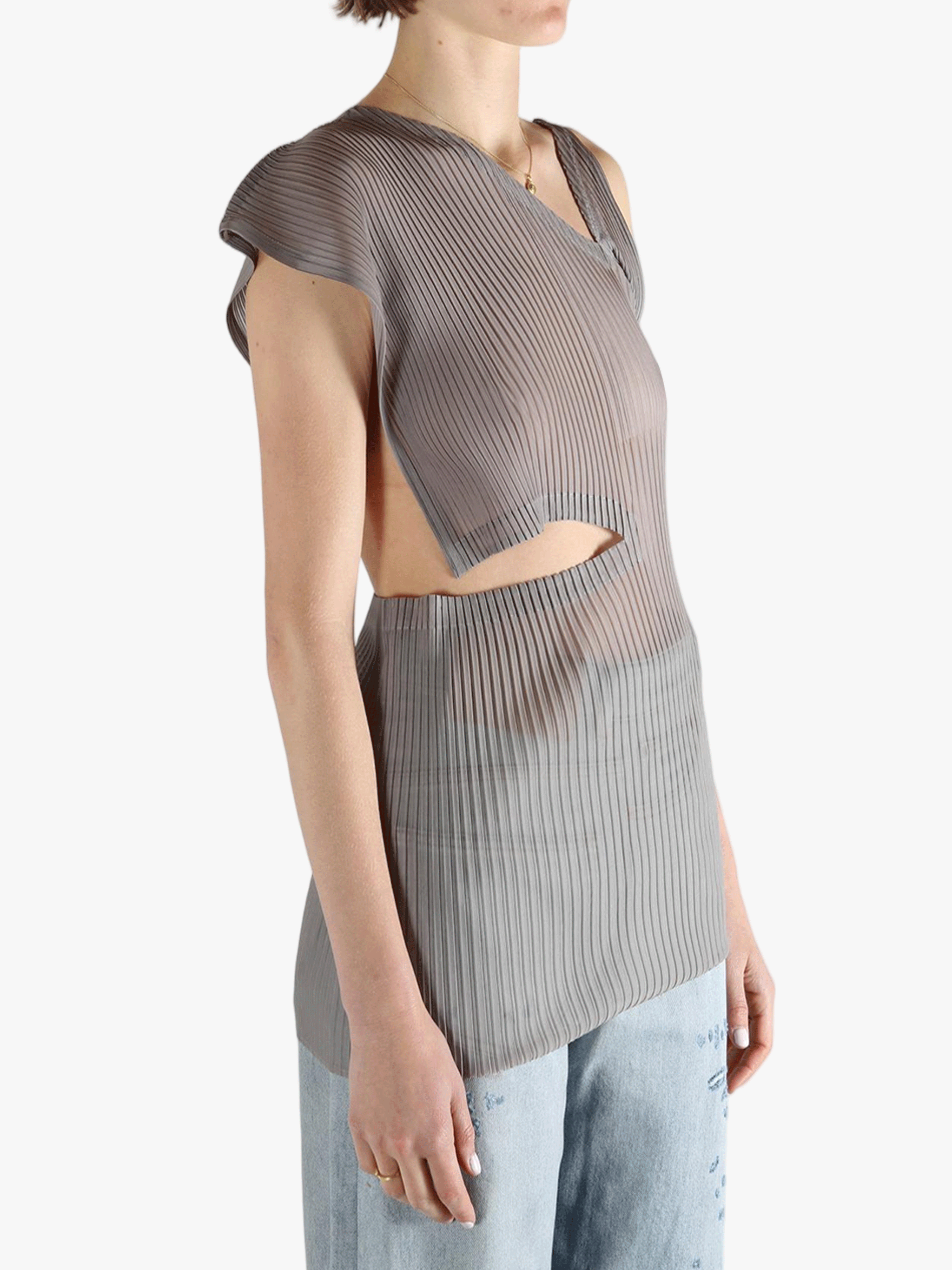 Grey shirt worn by a person, showing the shirt's fit