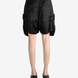 Black shorts worn by a person, showing the shorts's fit