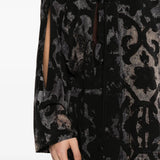 Close up of Black jacket, showing texture of the 100% silk fabric