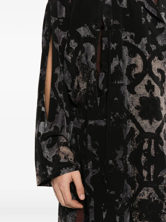 Close up of Black jacket, showing texture of the 100% silk fabric
