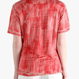 Red t-shirt worn by a person, showing the t-shirt's fit